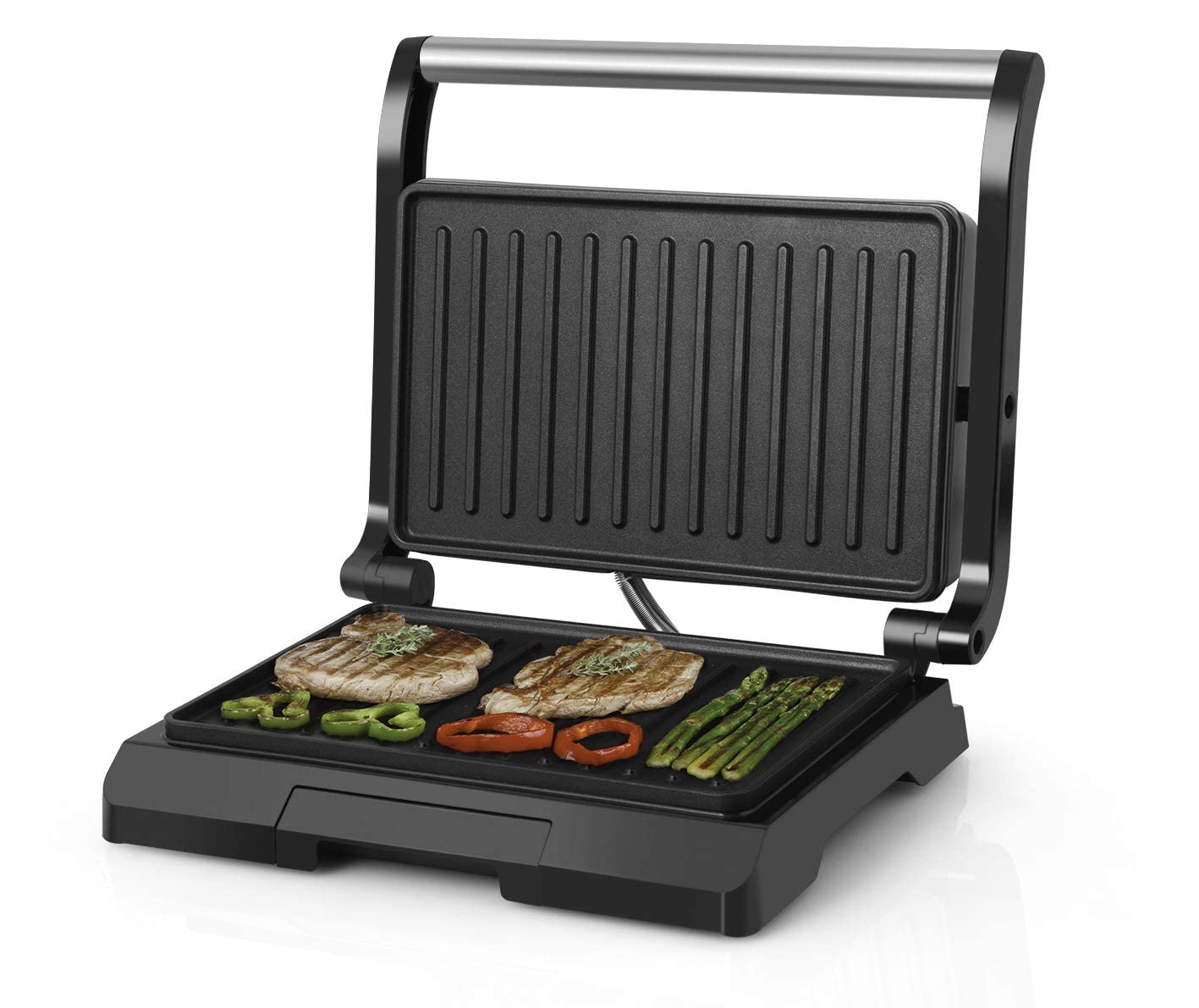 Grill eléctrico de 750 w. Con placas de recubrimiento antiadherente, parte superior de acero inoxidable, cierre de aseguridad, doble posición de placas. Dimensiones 27×23 cm.